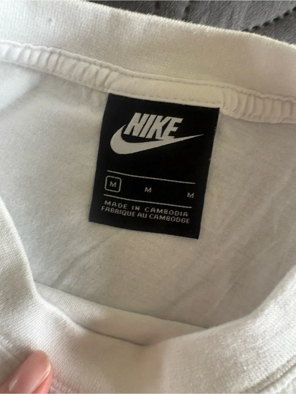 Nike White Crop Top with Multicolor Flag Graphics